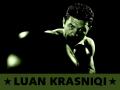 background: LUAN KRASNIQI AKA LION