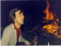 background: playing the guitar
